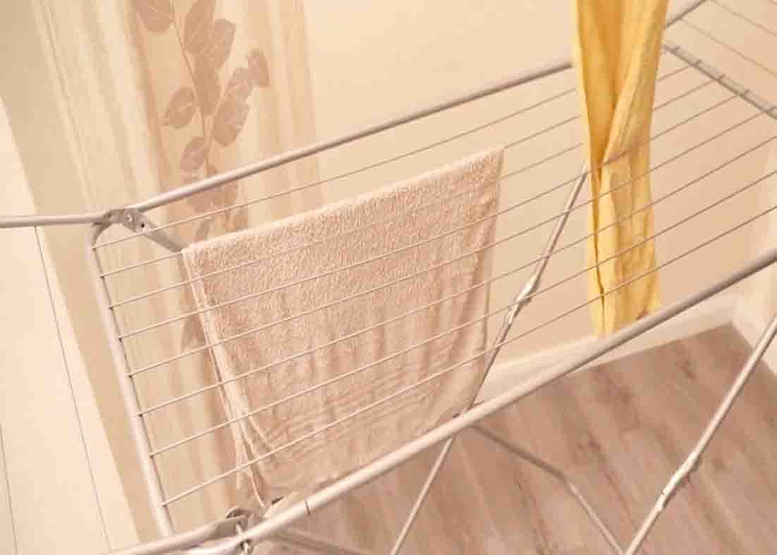 Hanging wet towels to cool down the apartment