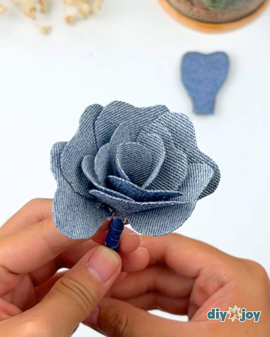 Denim Roses From Old Jeans — add the second stack of petals