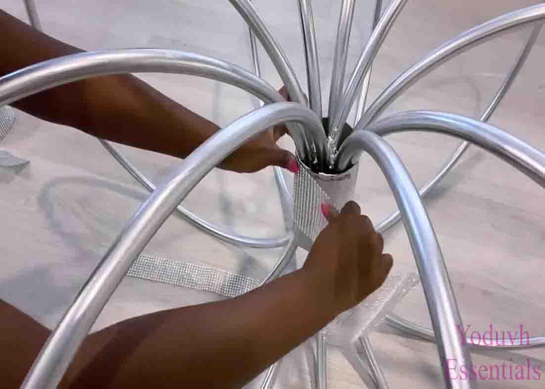 Adding some bling to the DIY coffee table using hula hoops