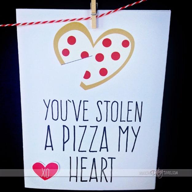 You've Stolen A Pizza My Heart printable Valentine card with a cut paper pizza slice and a corny pun