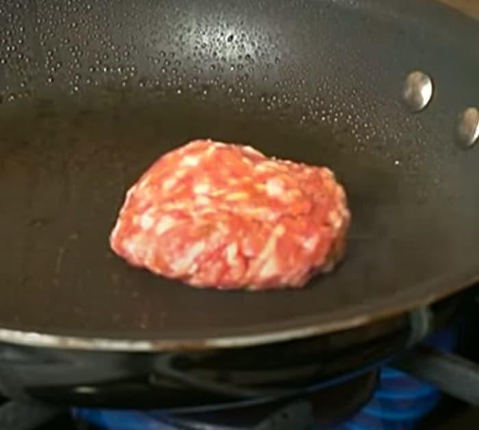 Cook sausage patties for a copycat McDonald's Egg McMuffin