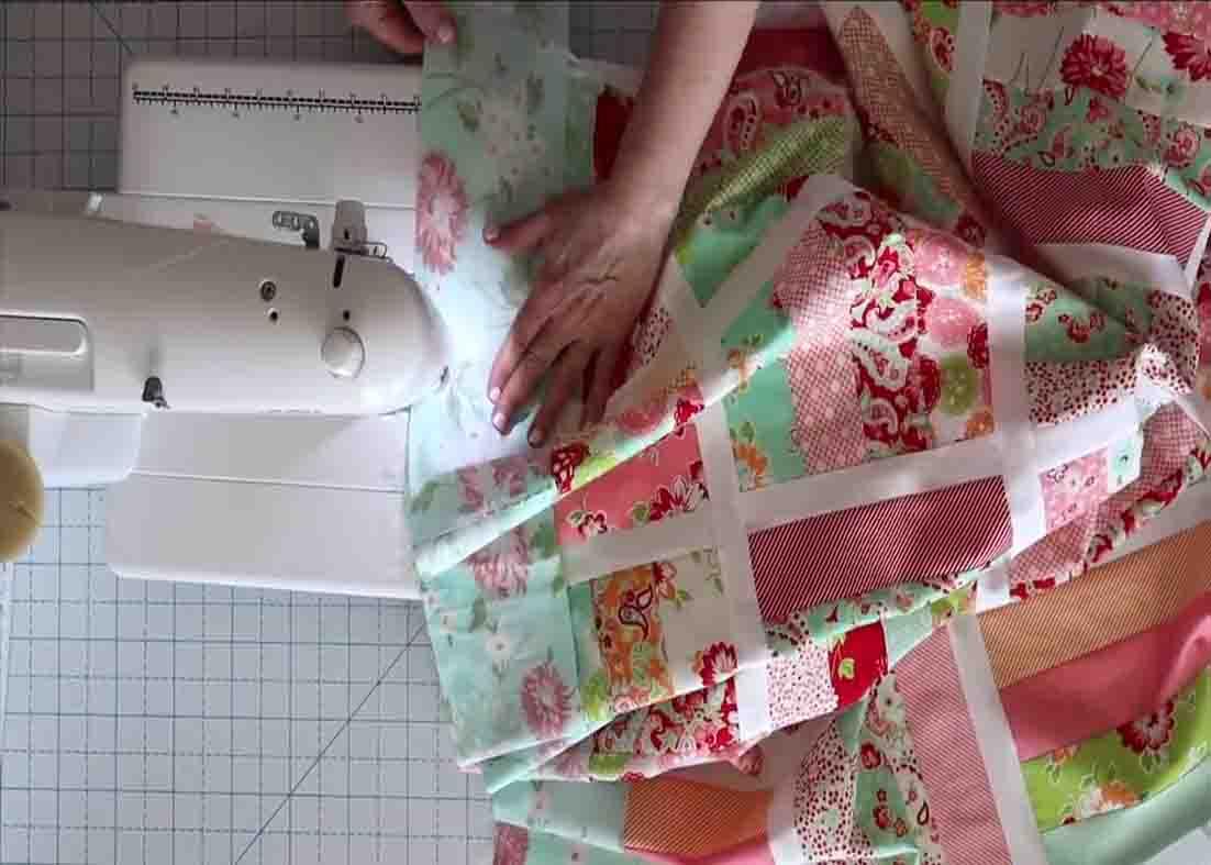 Sewing the borders of the quilting project