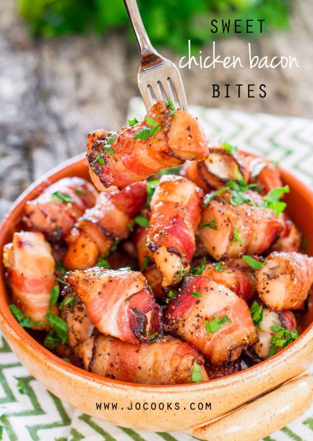Sweet chicken bacon bites, brown sugar glazed bacon wrapped chicken cubes piled in an orange serving bowl