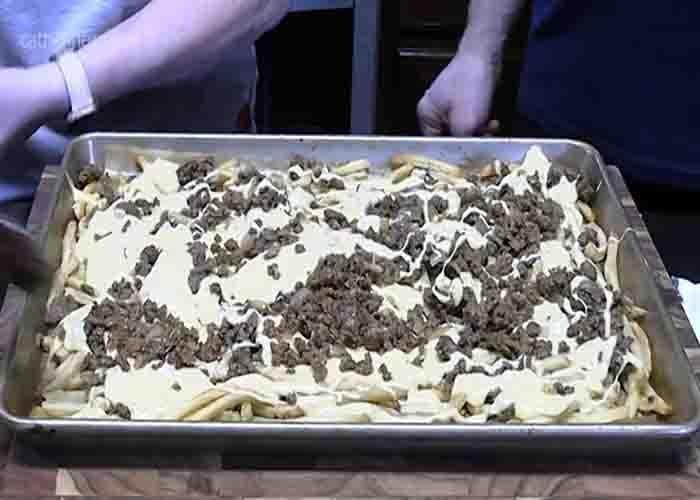 Assembling the Taco Bell copycat nacho cheese fries