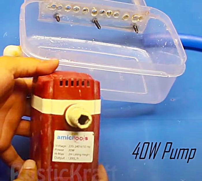 Make A Waterfall Out Of An Old Tupperware Container With A Pump