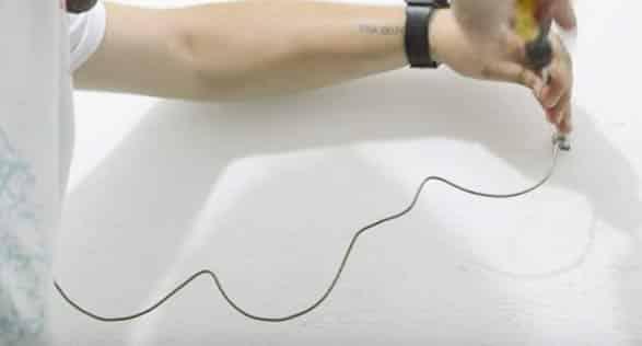 What He Does With A Coat Hanger Is Brilliant And Very Creative. Watch!