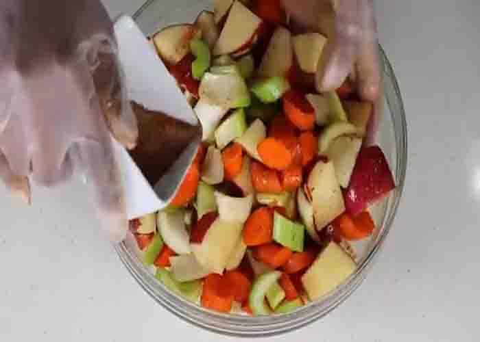 Seasoning the veggies for the turkey wings