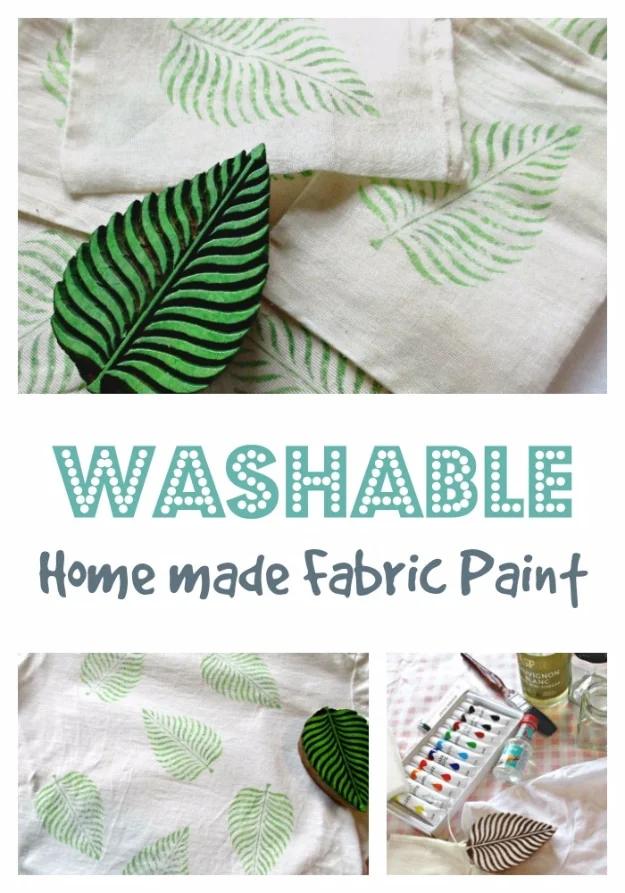Washable homemade fabric paint, green fern leaves stamped onto natural linen napkins beside a real leaf and paint set