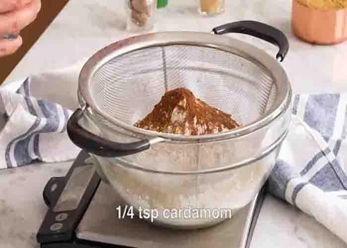 Sifting the dry ingredients for the pumpkin cookies