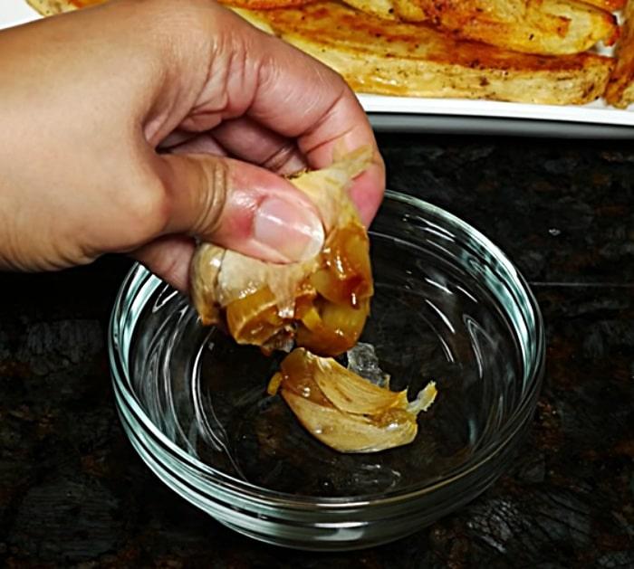 Garlic pod roasted in foil with potato wedges