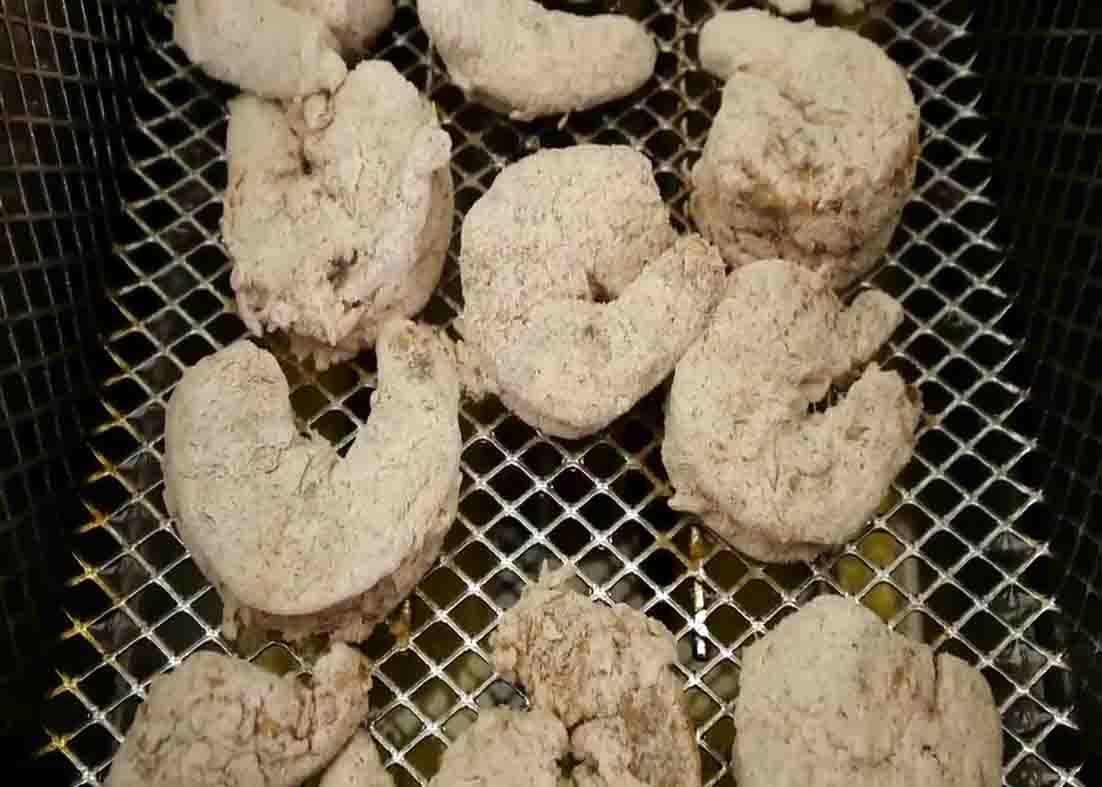 Getting the popcorn shrimp ready for deep frying