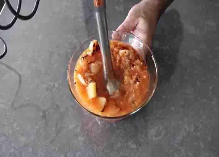 Blending the pineapple sriracha salsa