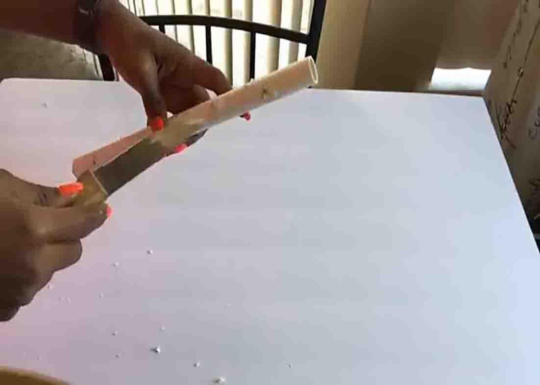Making holes on the pipe for the ornament balls