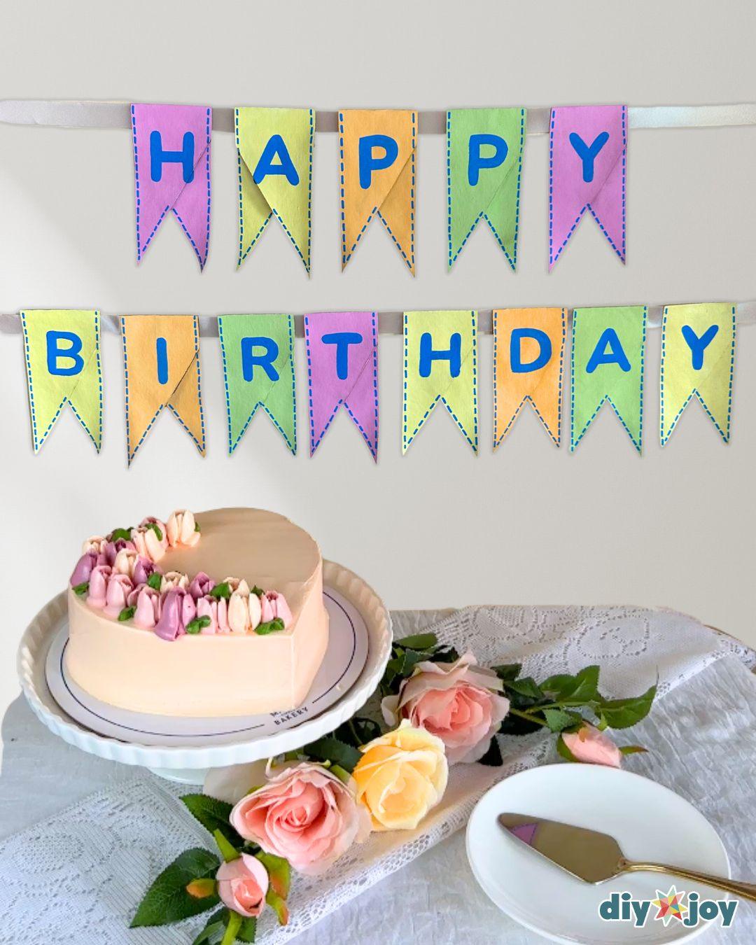 Birthday Banner Toilet Paper Rolls — hang