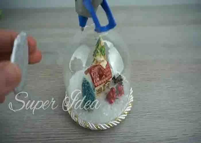 Decorating the DIY snow globe