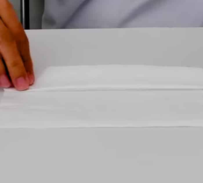 Make a simple face mask out of a paper towel