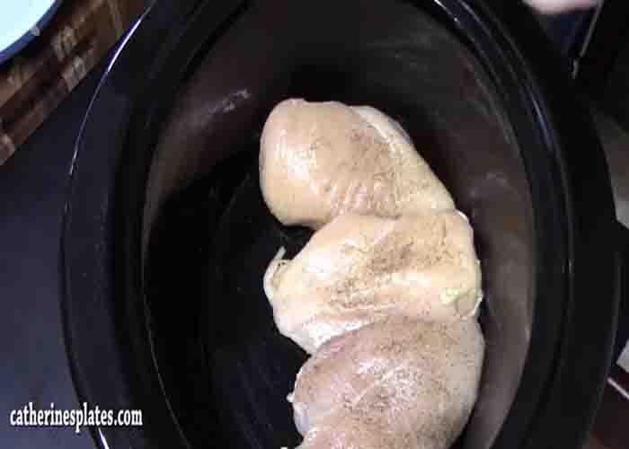 Seasoning the chicken for the angel chicken pasta