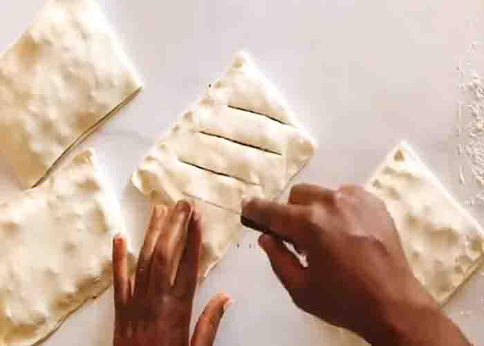 Cutting some slits into the puff pastry