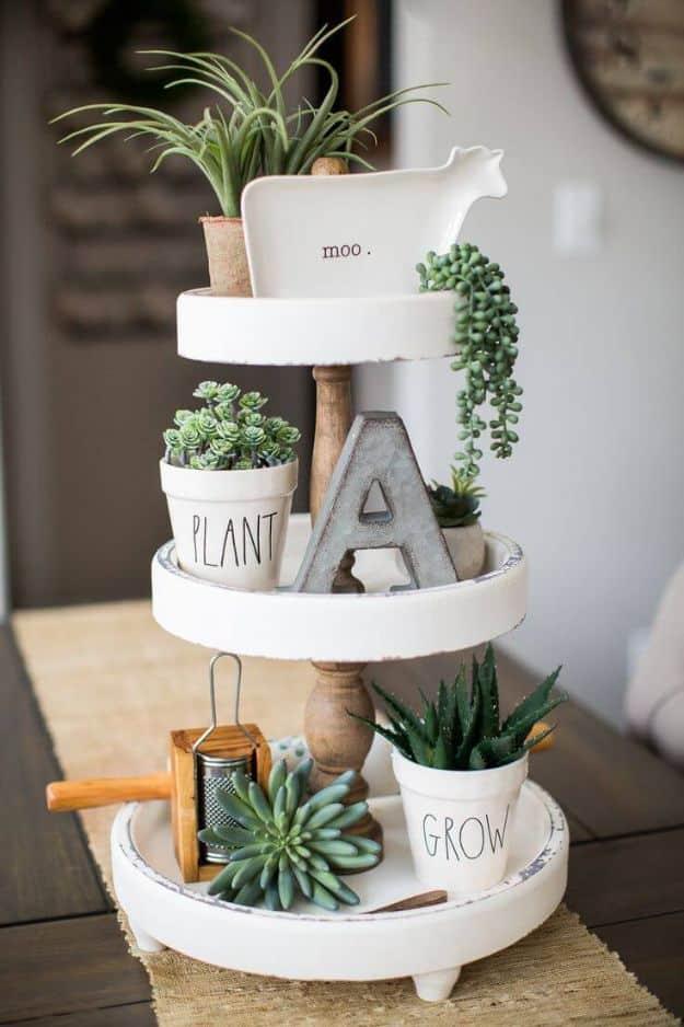 Tiered Succulent Garden with Knickknacks, one of the best white decor ideas on this list and an idea worth saving for later