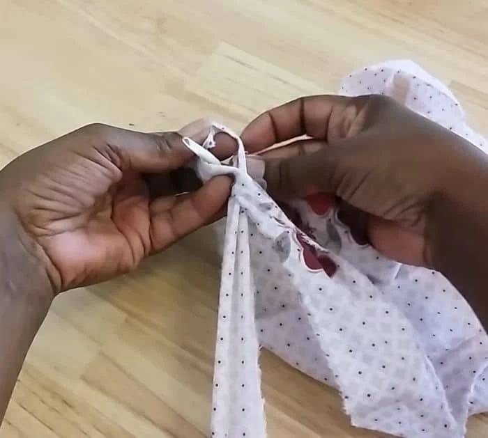 Old cotton sheets torn into strips with wire, wire cutters and painter's tape, the supply list for a rag rug