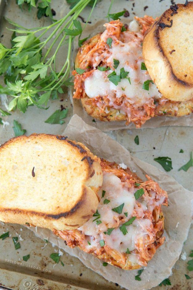 Shredded chicken parmesan sandwich on cheesy Texas toast with marinara sauce and melted cheese on a busy weeknight