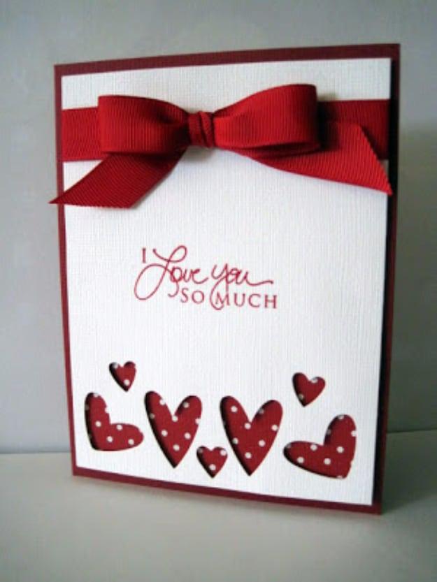 Hearts Abounding Valentine's card with three punched heart trios showing embossed patterned paper behind