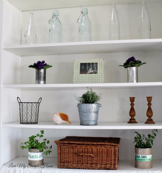 Farmhouse style shelves, white painted built in shelves styled with clear glass bottles, baskets and small plants