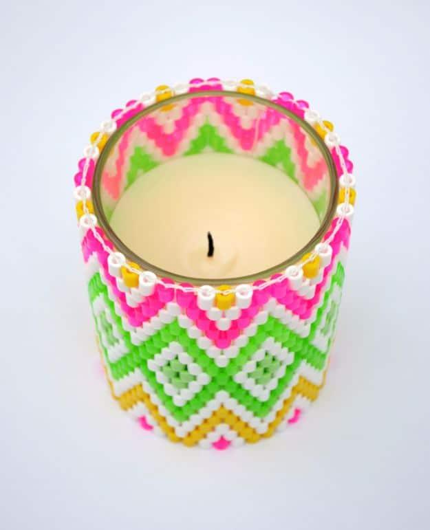 Colorful perler bead candle holder patterned by hand, an inexpensive bead craft that makes a nice handmade gift