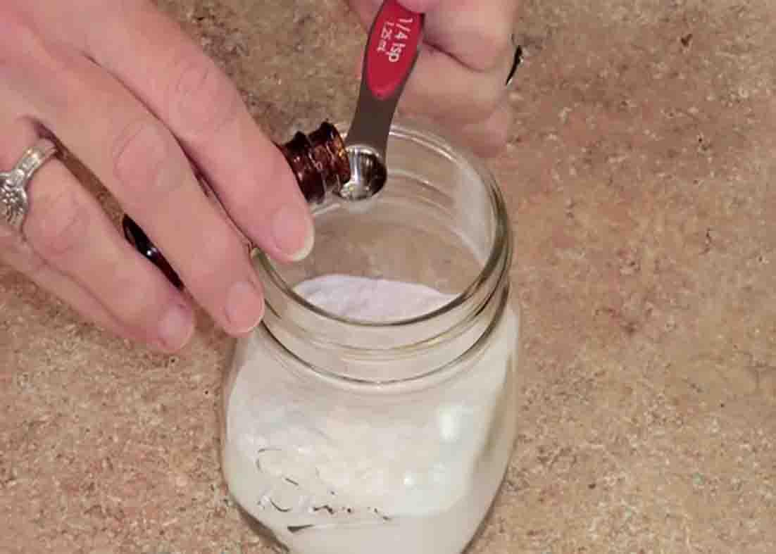 Combining the two ingredients needed for the DIY air freshener