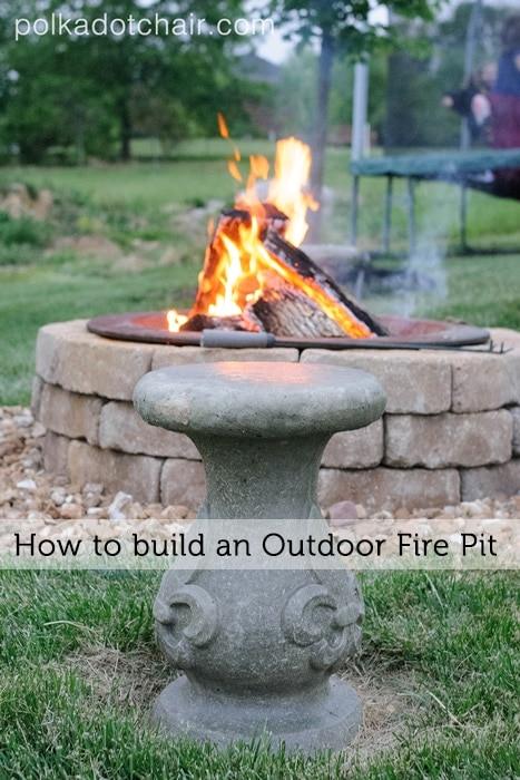 Firepit seating graphic reading How to build an Outdoor Fire Pit over a concrete bird bath pedestal by a lit fire pit