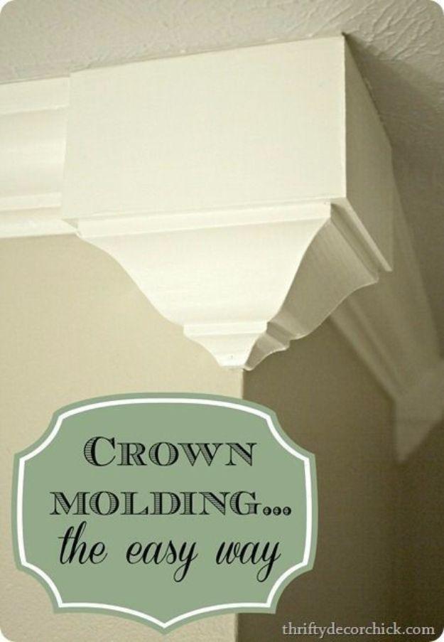 White painted crown molding with a decorative corner block fitted at the top of a beige wall against a textured ceiling