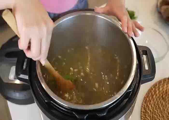 Simmering the ribs and beans in the pressure cooker