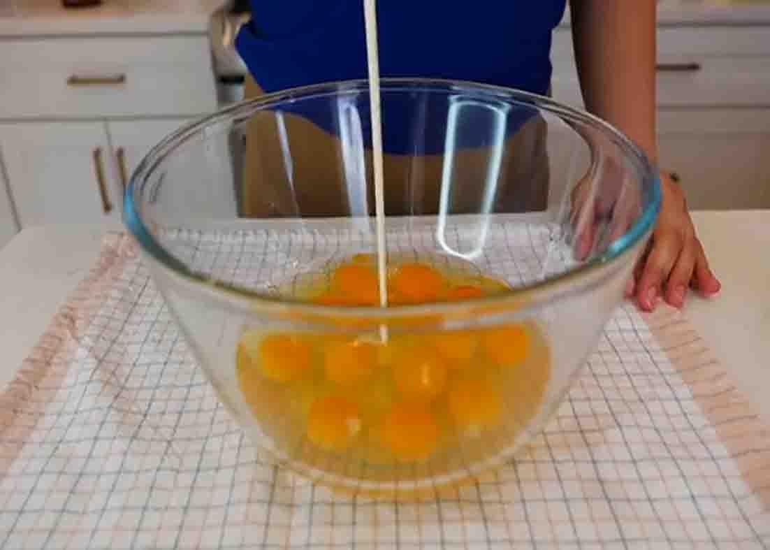Combining the ingredients for the sausage breakfast casserole