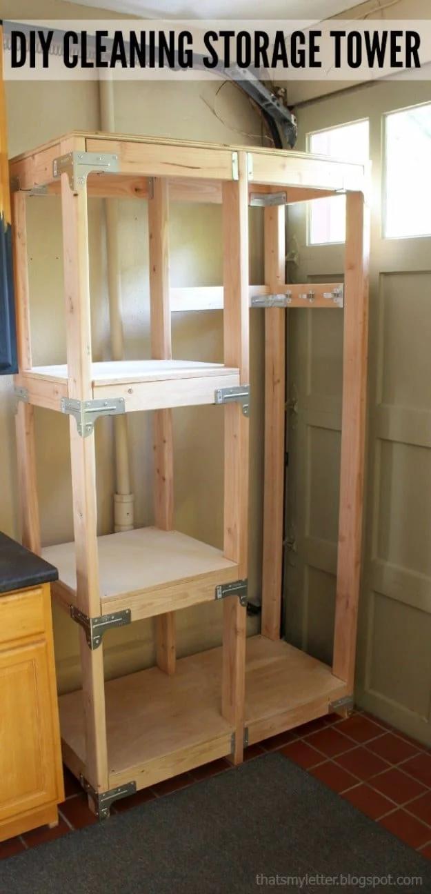 DIY Cleaning Storage Tower of raw 2x4s and plywood shelves with metal tie connectors standing in a doorway