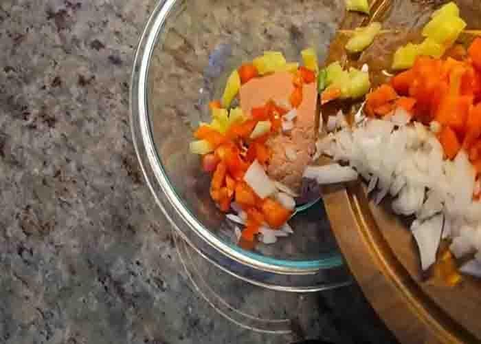 Combining the ingredients for the tuna avocado salad