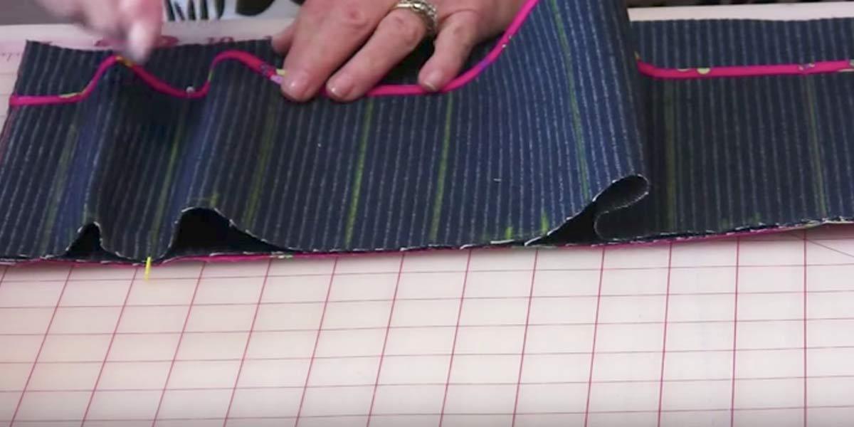 She Sews Down Each Green Line In The Fabric And The Reason She Does This Is So Clever (Watch!)