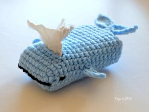 A whale shaped tissue box cozy knit for a playful nursery or desk decor gift that always gets compliments