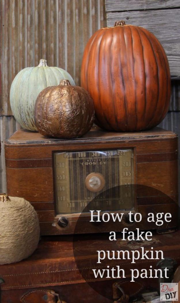 Foam pumpkin brushed with a brown aging glaze and softened with a cloth so it looks like a real pumpkin