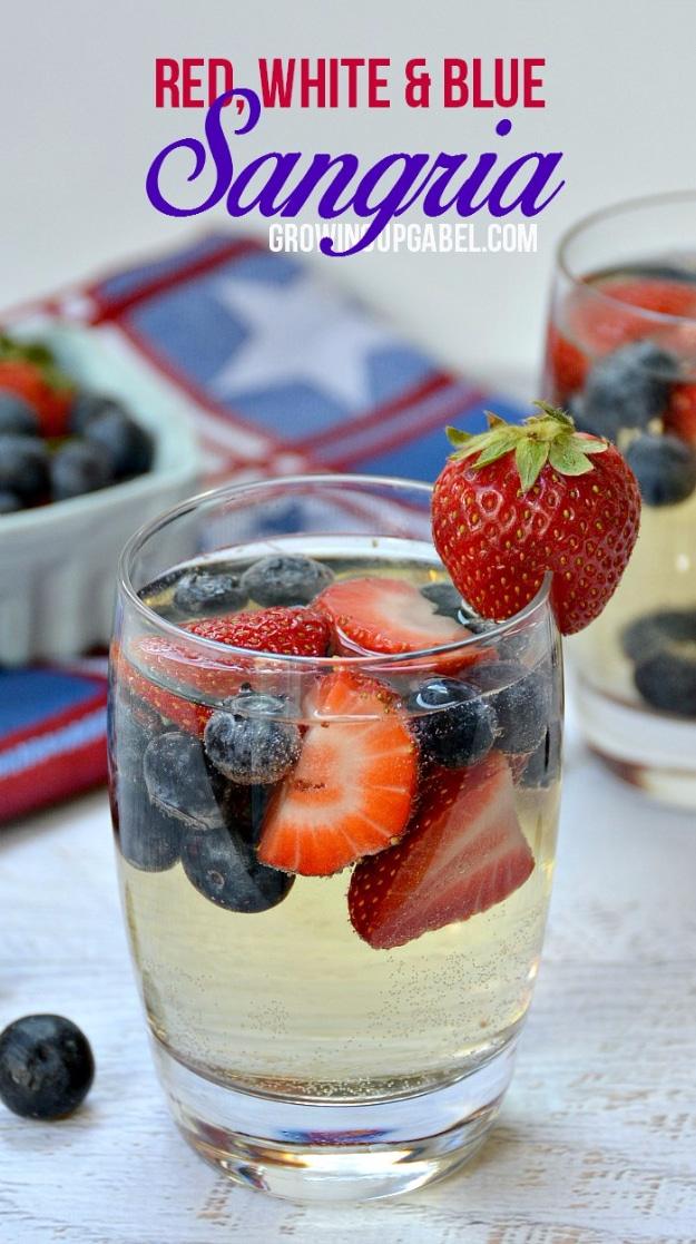White wine sangria mixed with colored sugar and fruit for a custom patriotic party sip for the whole family