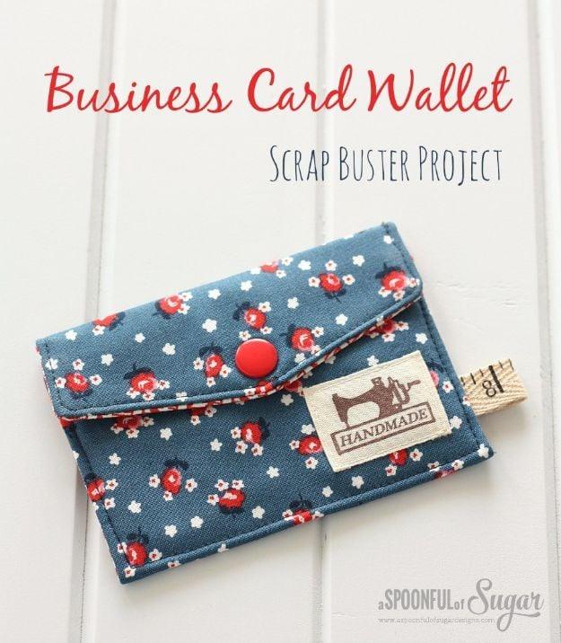 Business card wallet graphic, a blue floral wallet with a red snap and a small handmade tag, title and subtitle typeset above