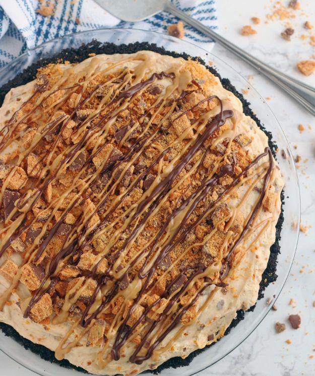 No bake Butterfinger pie with a peanut butter cream filling topped with crushed candy bar pieces, an easy no bake dessert