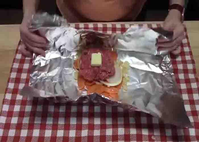 Assembling the hobo cheeseburger foil packets