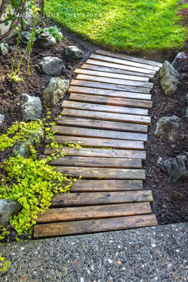 Pallet Wood Garden Walkway, a fun DIY garden idea worth trying this season and a pretty accent piece for any garden bed