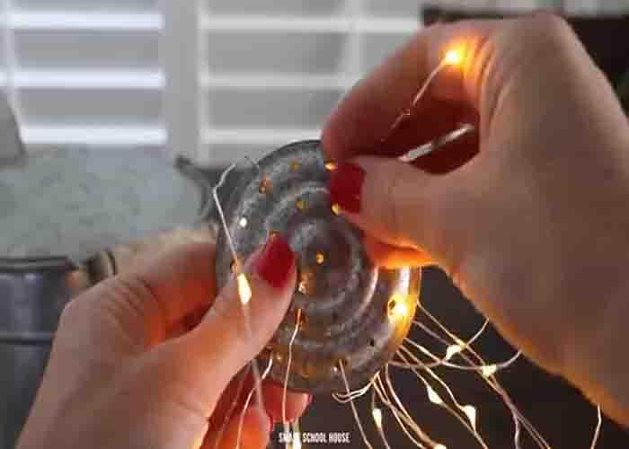 Pulling out the fairy lights through the showerhead