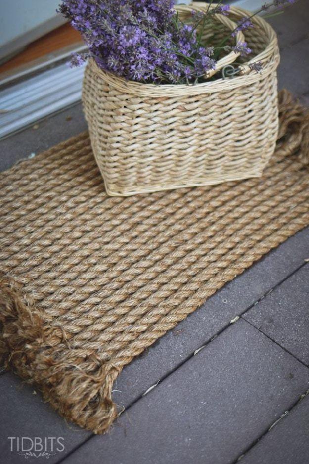 Natural rope DIY rug glued in rows onto a doormat base with frayed fringed ends, a lavender basket sitting on it