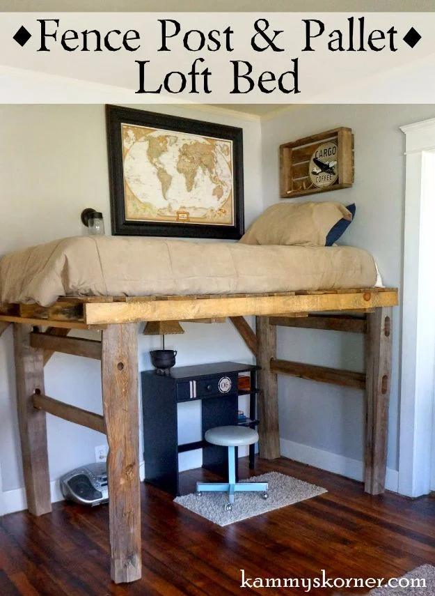 Fence post and pallet loft bed, a rough timber loft bed on four reclaimed posts with a desk and stool underneath
