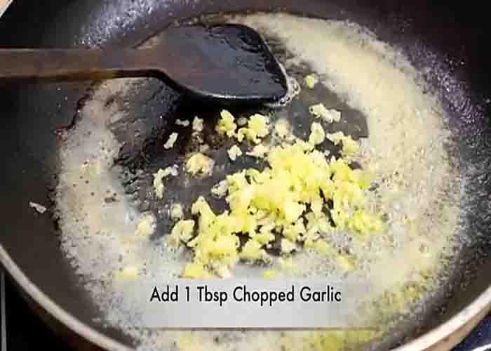 Making the garlic butter sauce for the fish