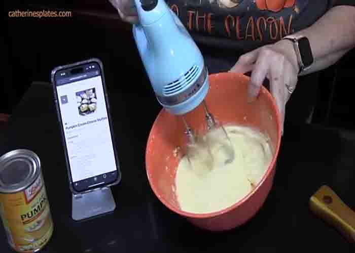 Mixing the cream cheese for the pumpkin muffins