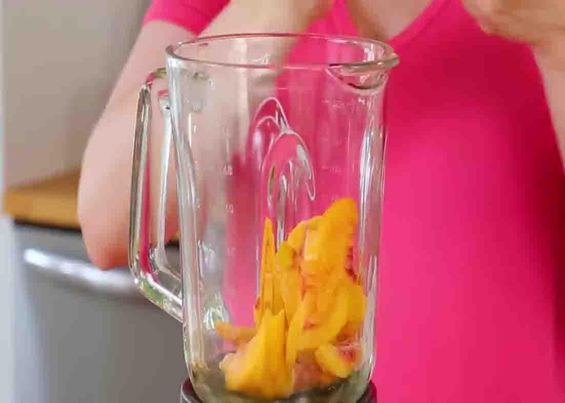 Add the fruits to the blender to make the breakfast smoothie