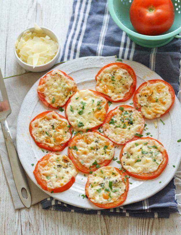 Baked parmesan tomatoes, thick tomato slices topped with melted shaved parmesan and dried Italian herbs